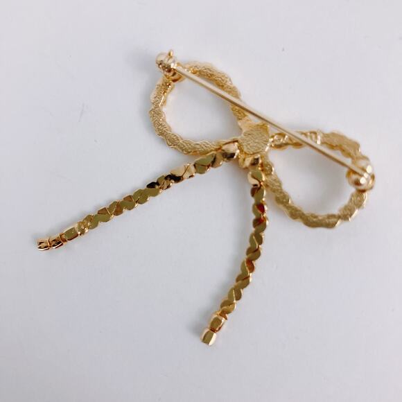 Vintage Signed Avon Clear Marquise Rhinestone Bow Brooch Gold Tone Ribbon Pin - Picture 6 of 8